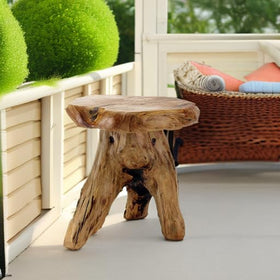 WELLAND small-nightstand cedar stump keeps essentials within easy reach.