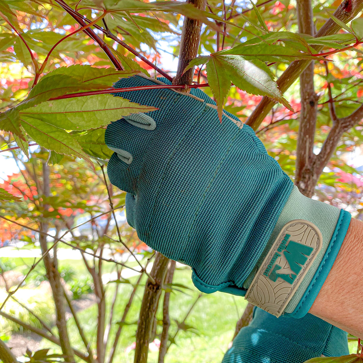 Wells Lamont high dexterity gloves in green with lightly padded palm and knuckles for protection