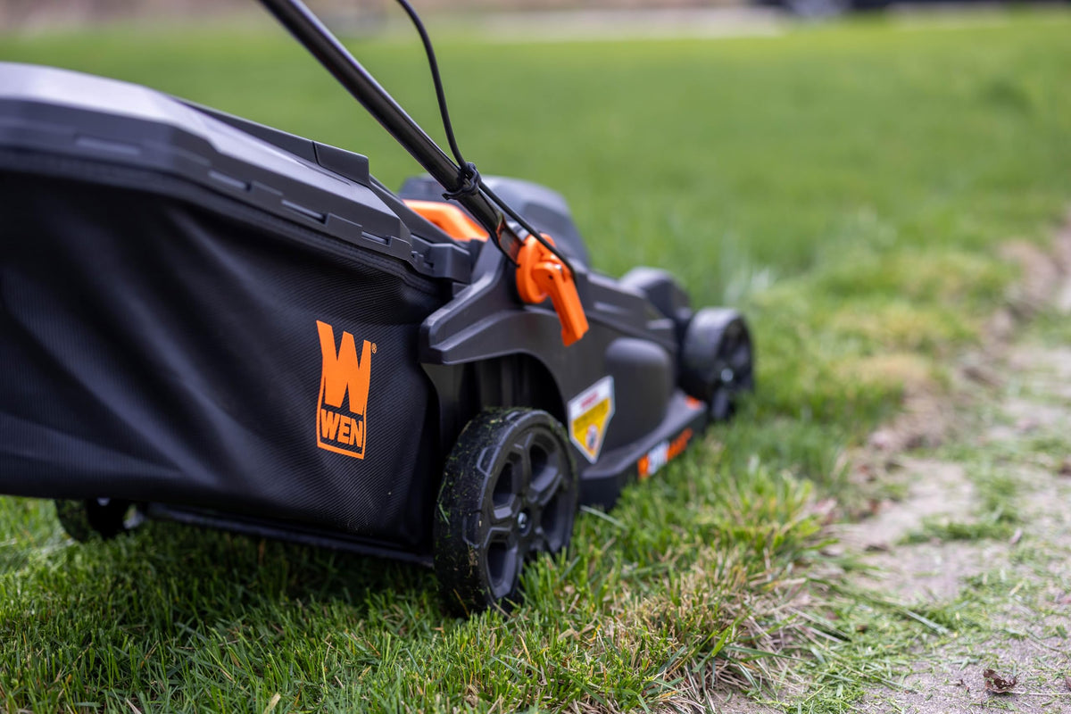 WEN collapsible handle enables upright storage after mowing.