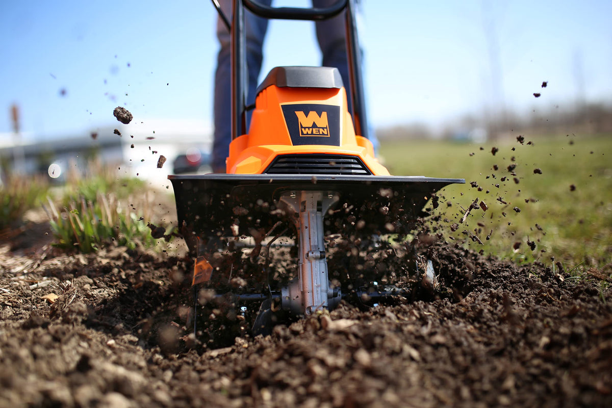 WEN TC1014 side handle setup enables controlled steering during tilling.