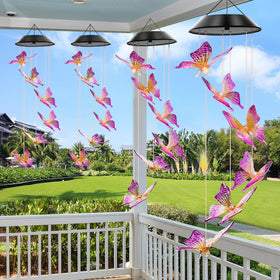 WENANA butterfly wind chimes emit a soft night glow for tranquil outdoor spaces.
