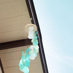 Wenqik seashell wind chime hanging by porch ready for setup