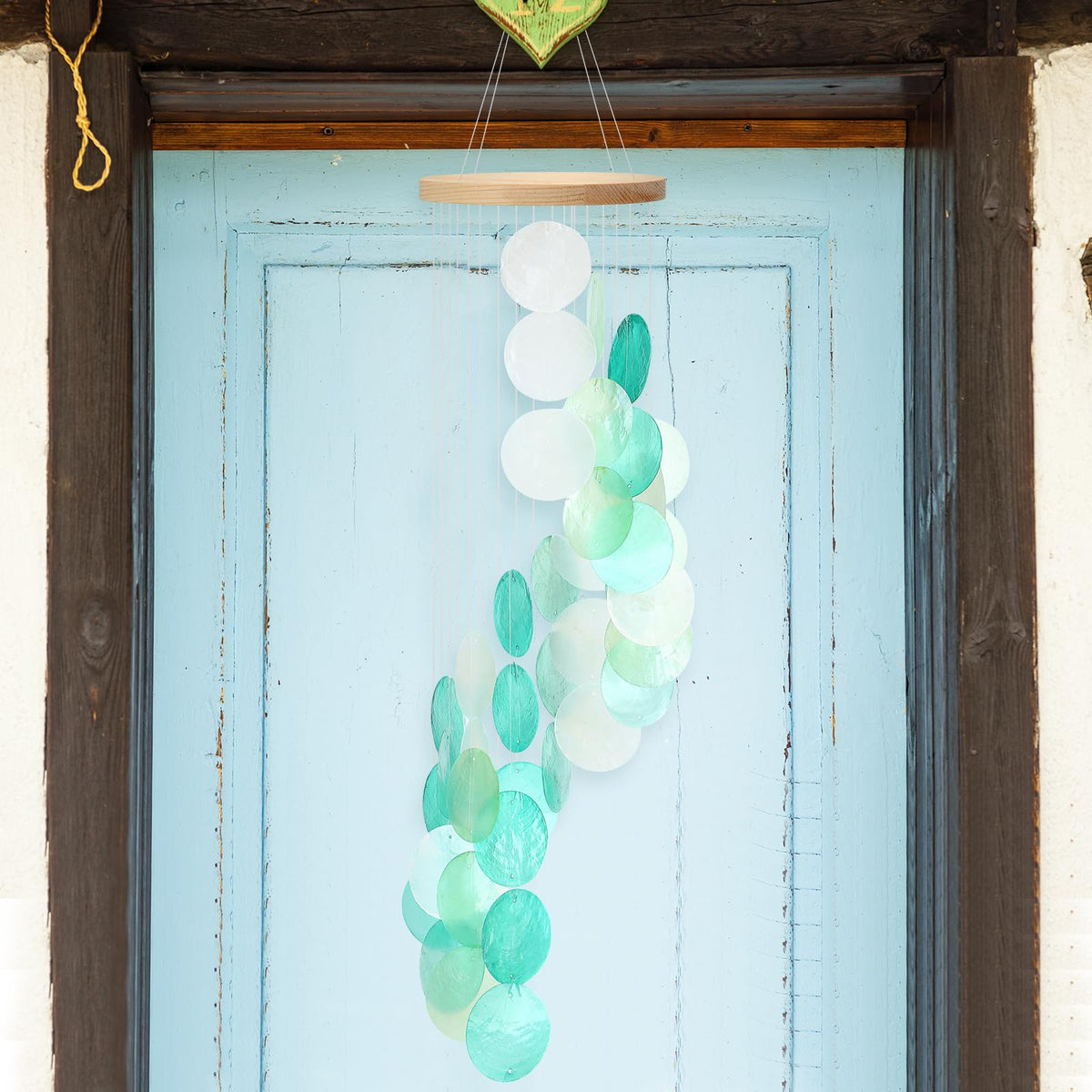 Wenqik seashell wind chime balcony display with coastal vibe