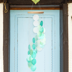 Wenqik seashell wind chime balcony display with coastal vibe