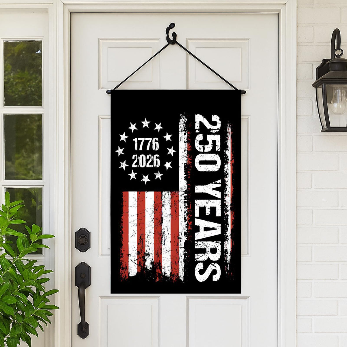 WENWELL Patriotic garden flag in yard invites festive seasonal ambiance.