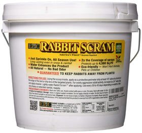 Wetsel Rabbit Scram being sprinkled to deter rabbits in sunny, dry conditions.