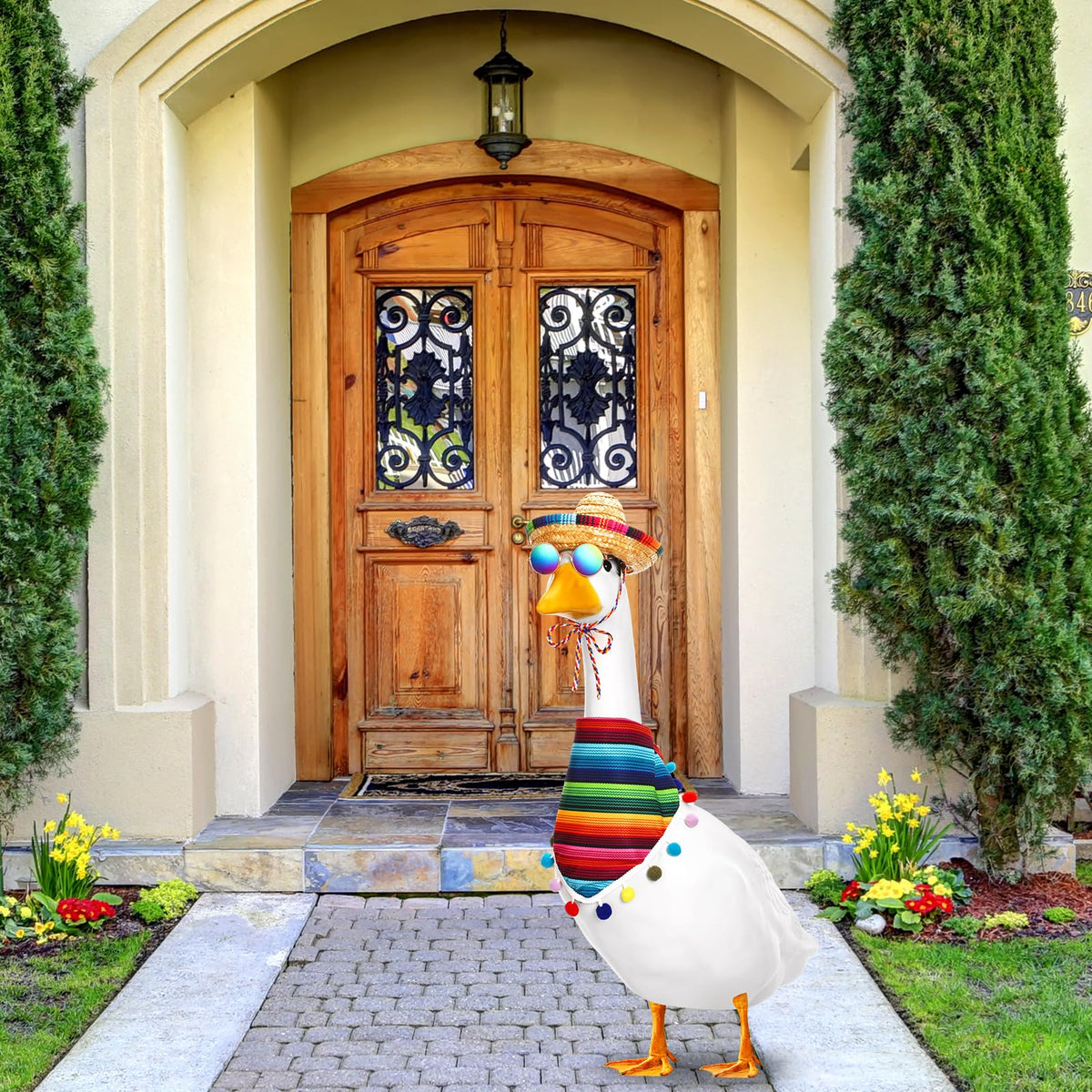 Weysat lawn goose wearing the outfit in a sunny garden setting