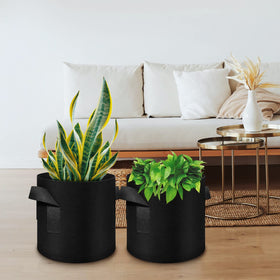 WHATWEARS reinforced handles simplify moving pots for seasonal rearrangement.
