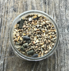 Wholesome Harvest goat feed ingredients barley and alfalfa label close-up