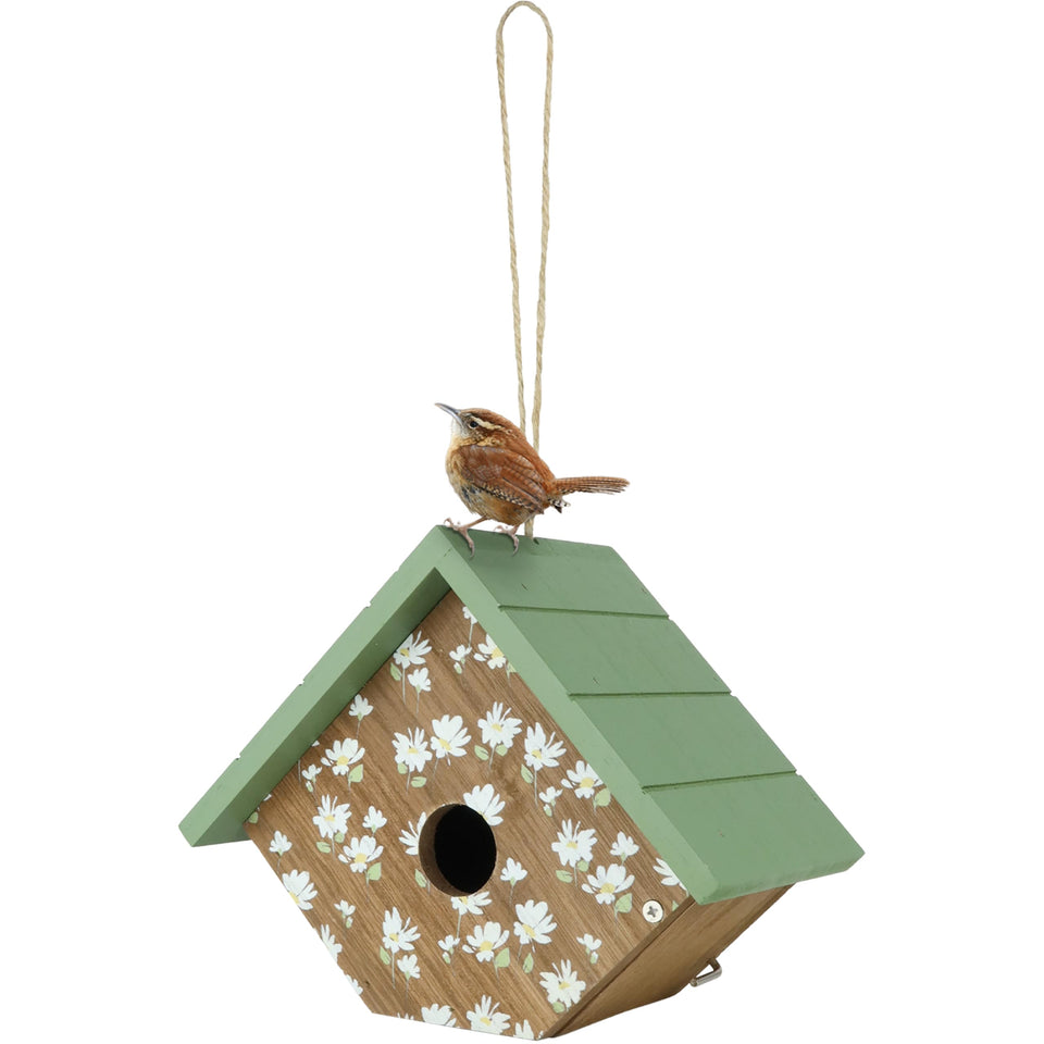 Wild Wings Springwood Daisy Wren House on garden wall attracts wrens and chickadees.