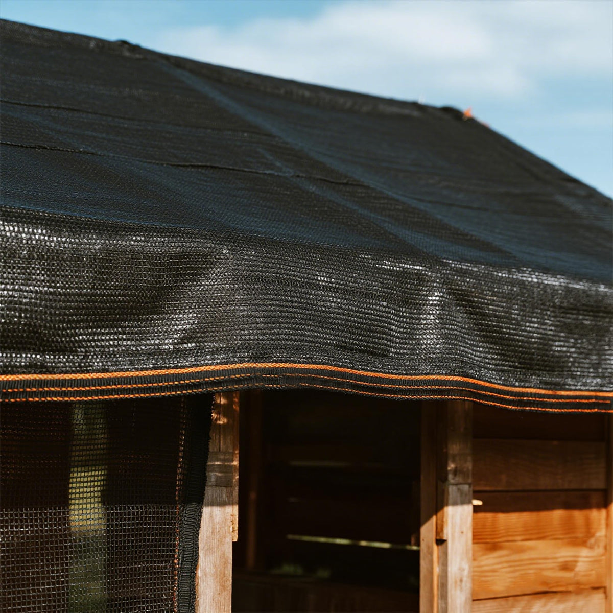 Winemana shade cloth protects tomato plants from harsh sun.