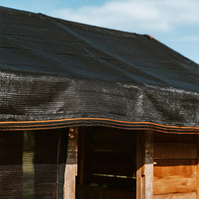 Winemana shade cloth protects tomato plants from harsh sun.