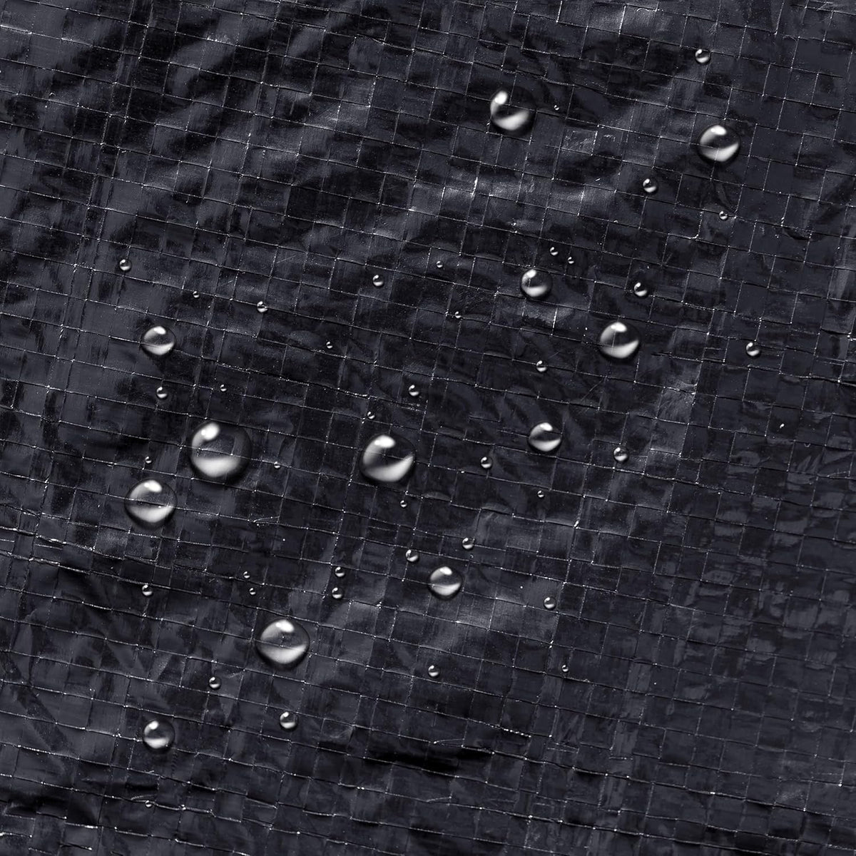 Winter Block blue cover on pool demonstrates weatherproof protection.