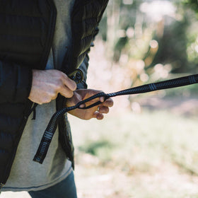 Wise Owl Outfitters straps wrapped around a tree for versatile mounting