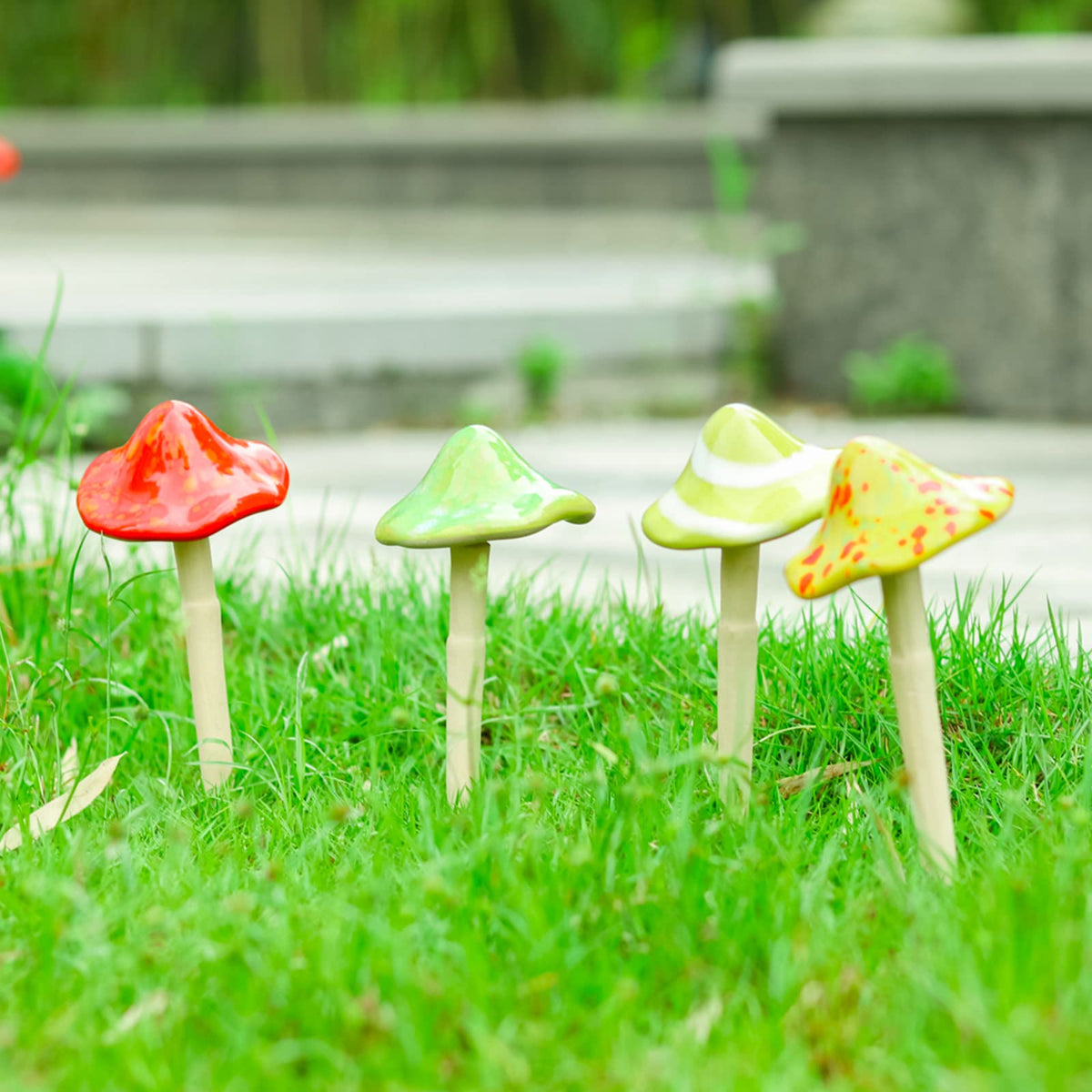 Wonder Garden ceramic mushroom garden decor four-piece set for outdoor fairy gardens.