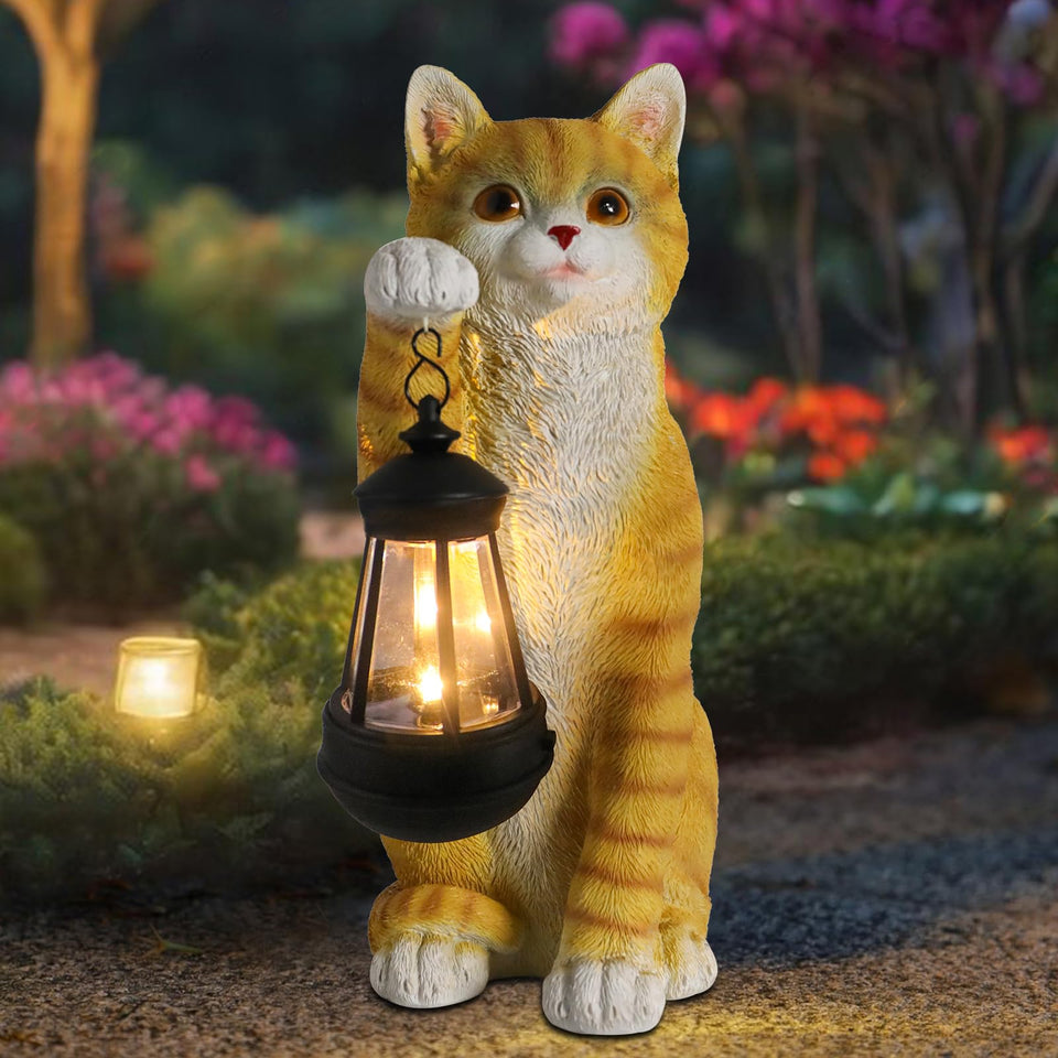 WONDER GARDEN solar cat statue with lantern lighting your garden at dusk.