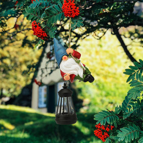 WONDHOME climbing gnome grips a vine for whimsical garden charm
