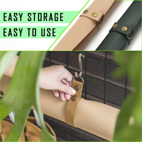 WondMall plant mat with copper corner buttons prevents spills.