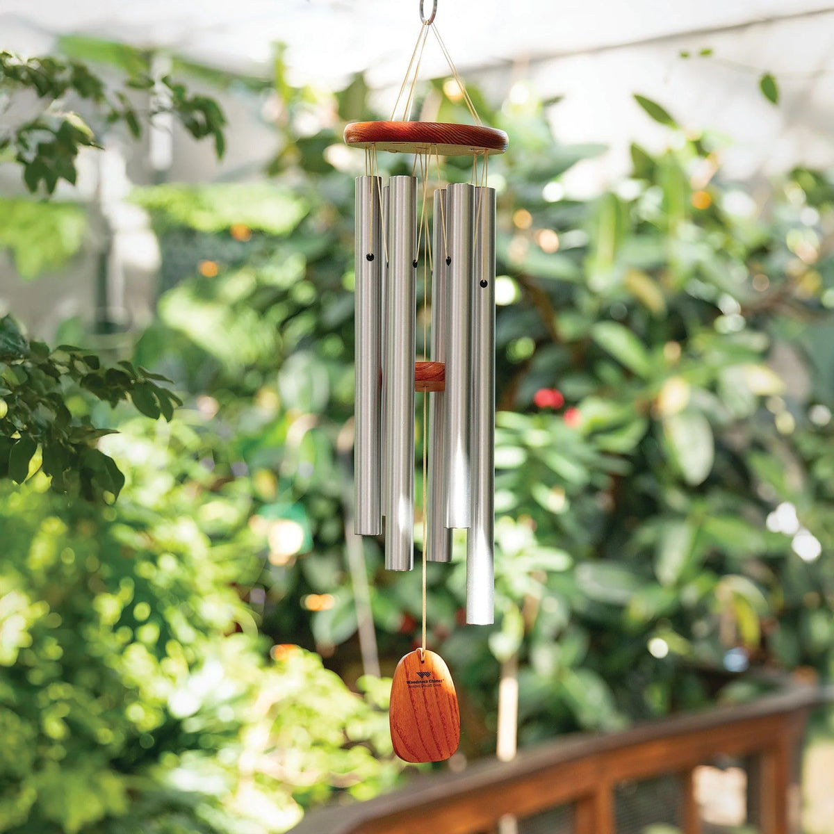 Woodstock Chimes Amazing Grace chime in garden setting for calm soundscape.