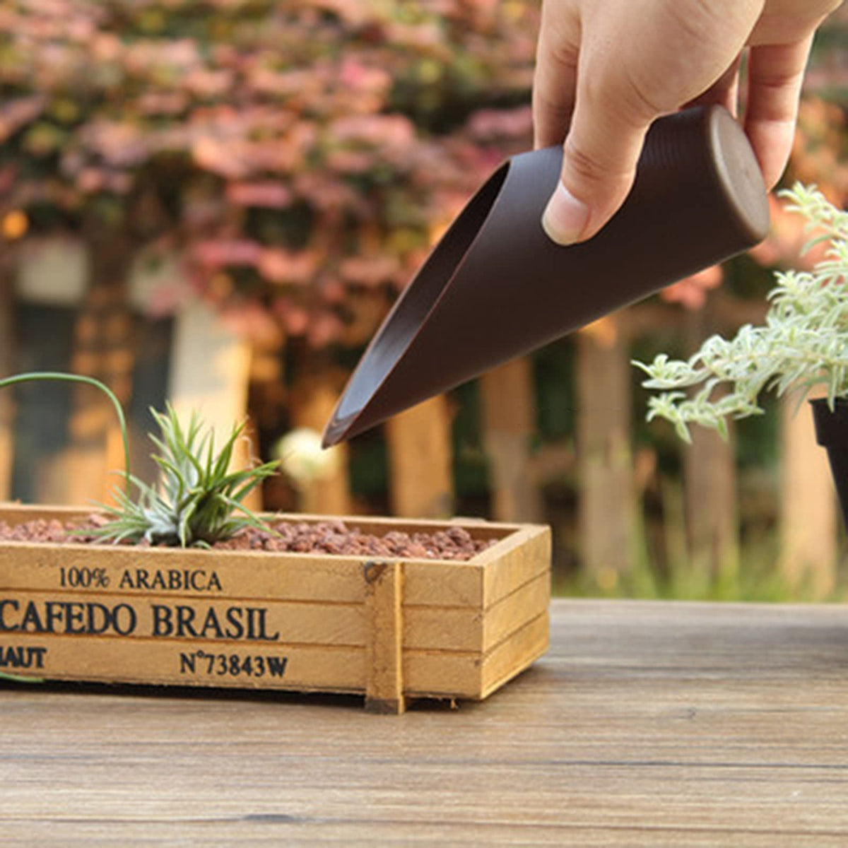 WORAMUK pink mini soil scoop for small plant transplanting.