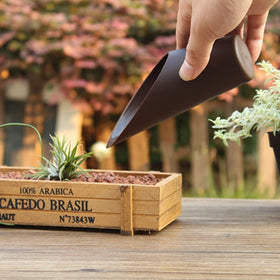 WORAMUK pink mini soil scoop for small plant transplanting.
