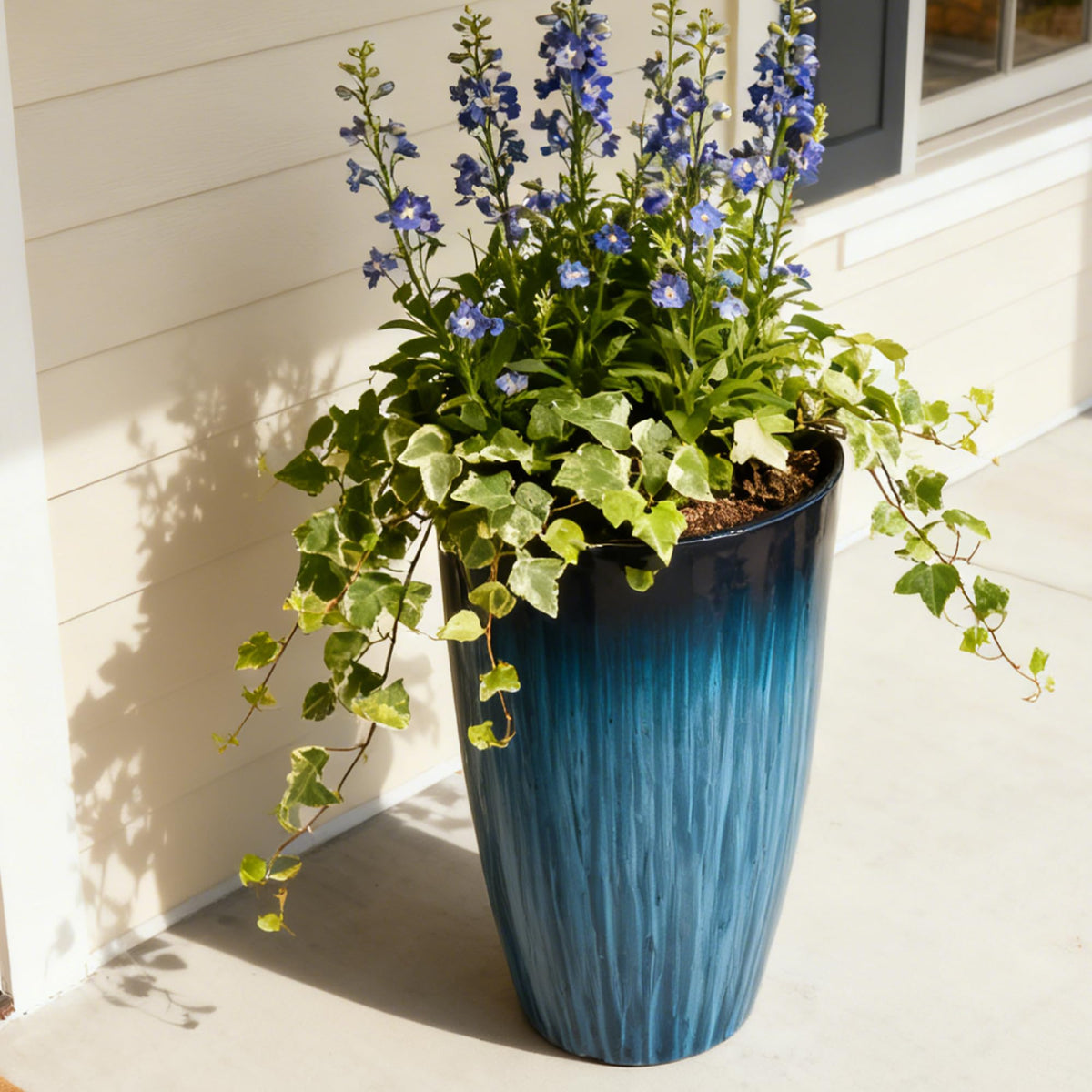 Worth Garden planter features drainage holes to prevent water buildup.