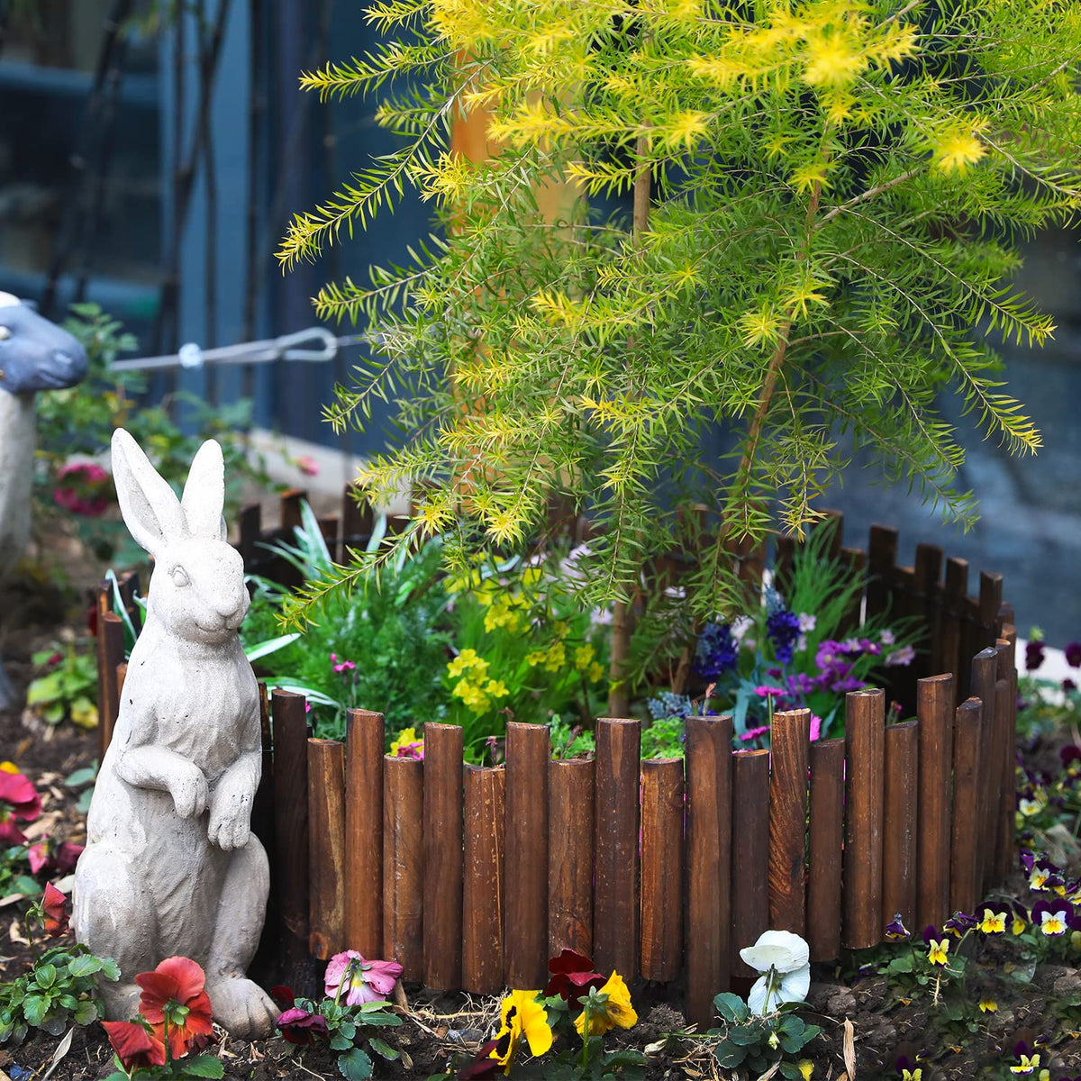 Worth Garden fence stakes stand 4 inches high for quick no-dig installation.