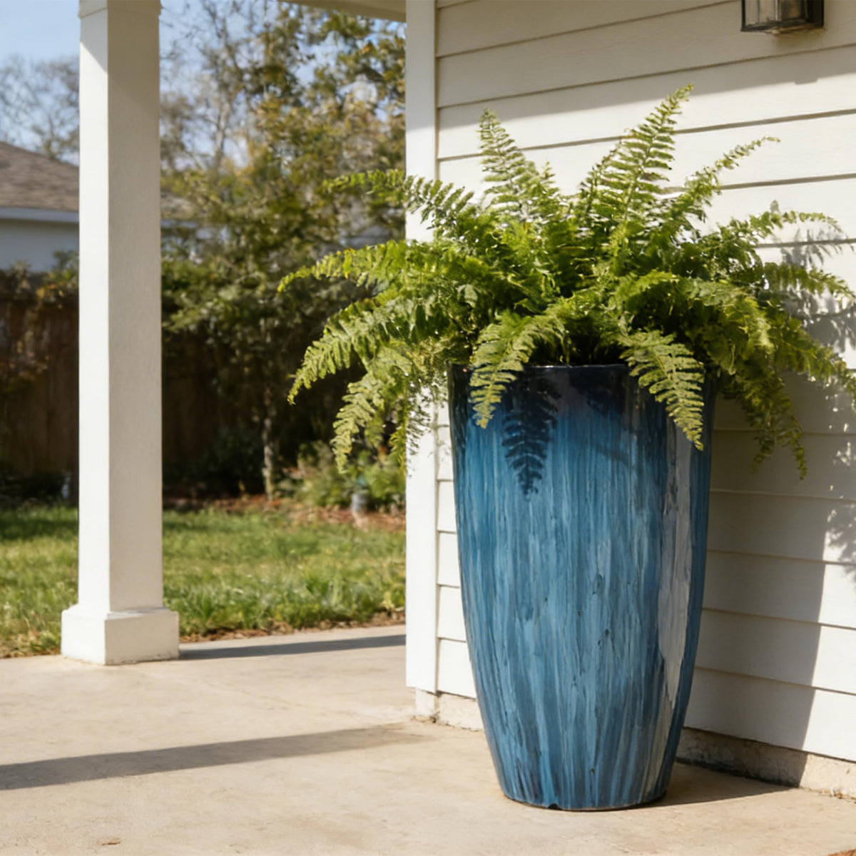 Worth Garden tall 23.5 inch planter offers ample root space for larger plants.