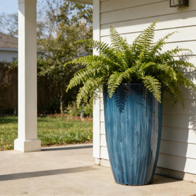 Worth Garden tall 23.5 inch planter offers ample root space for larger plants.