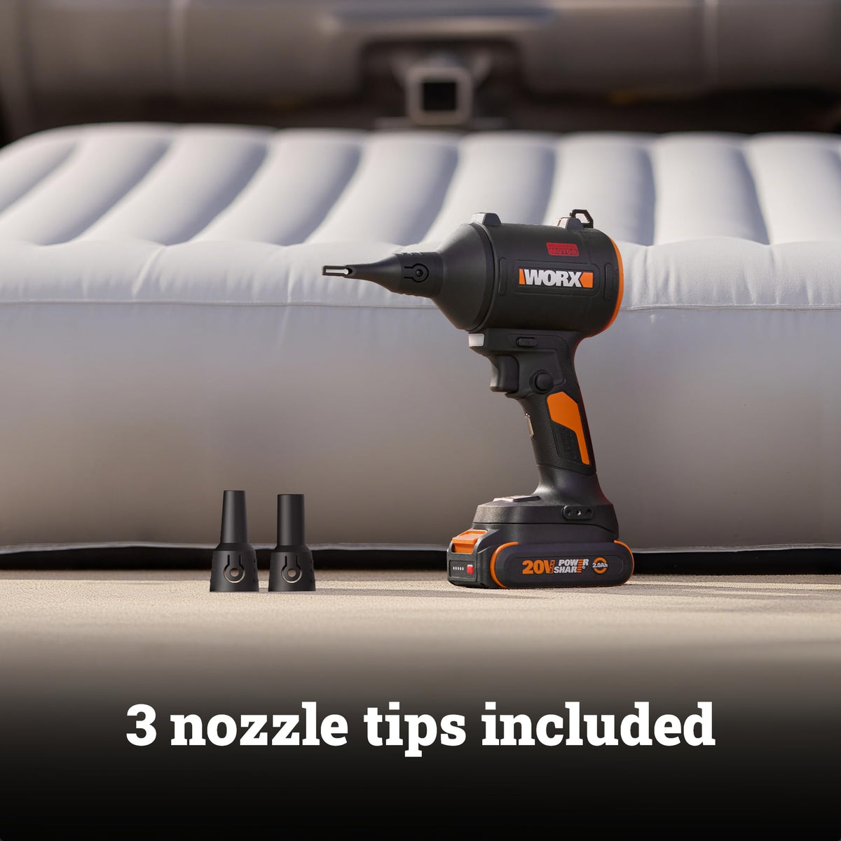 WORX WX099L handheld use in a workshop for debris clearance