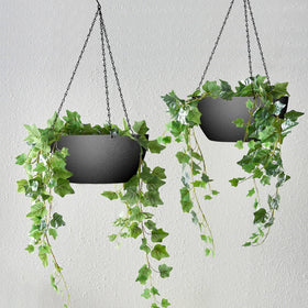 WOUSIWER weather durable plastic planter ready for sun and cold year round use.