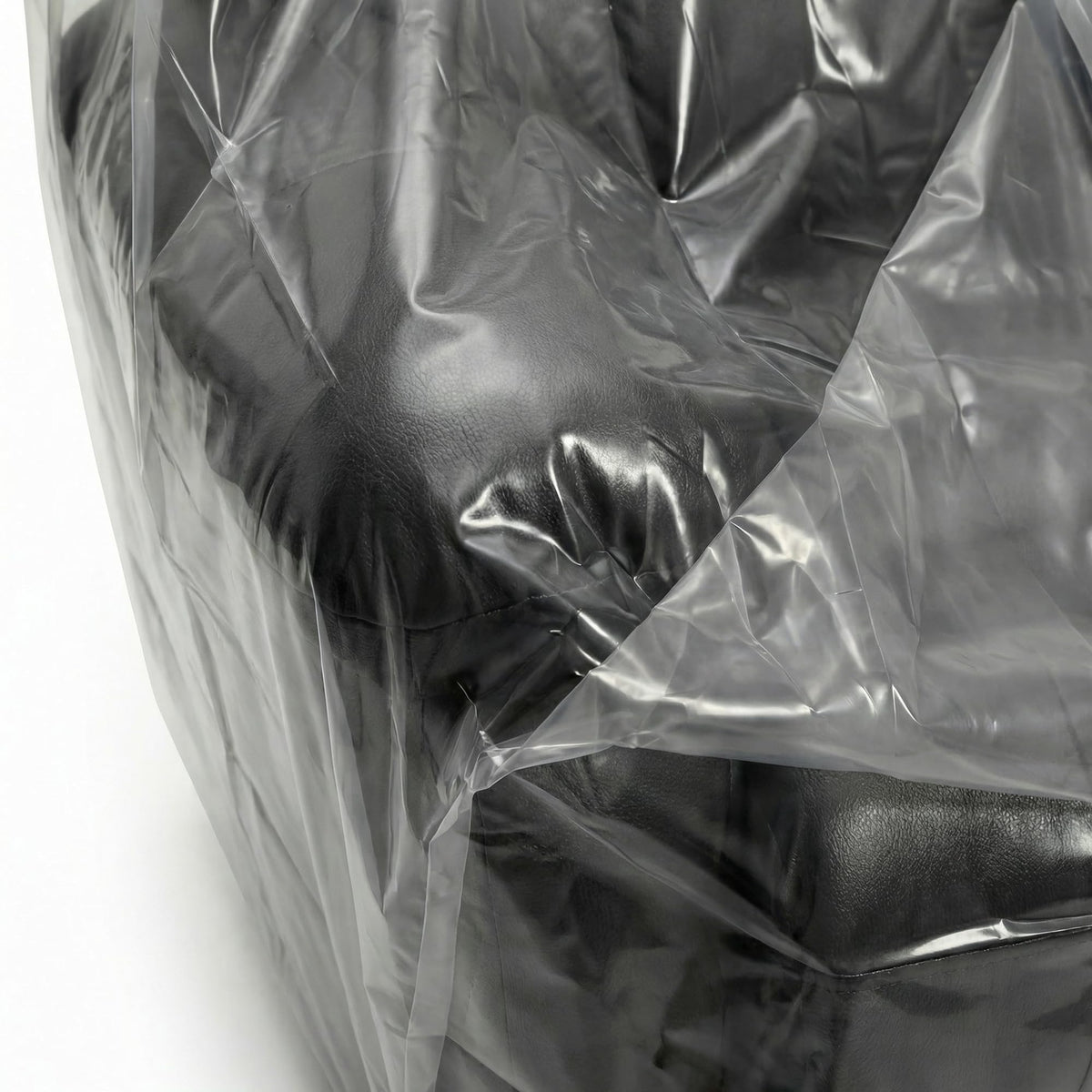 Wowfit chair cover on an armchair providing dust protection