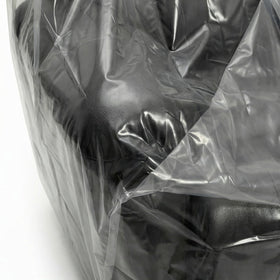 Wowfit chair cover on an armchair providing dust protection
