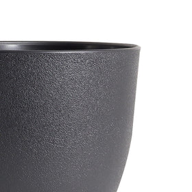 WSMKSZ indoor plant display with black pots on a shelf, ideal for styling.