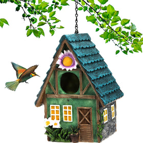 WUWEOT garden bird house outdoors invites small birds with a sunlit entrance.