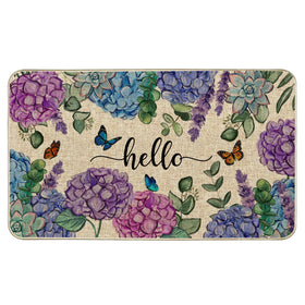 Wylumen Welcome Spring hydrangea door mat adds vibrant curb appeal for entryways.