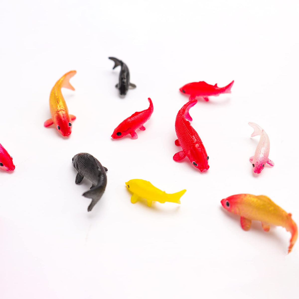 X Hot Popcorn small koi fish figurine for delicate dioramas.