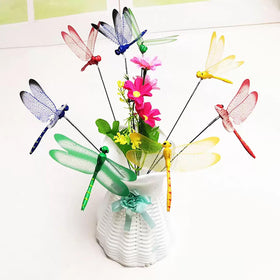 Xandova dragonfly clip on a flower bed for natural charm