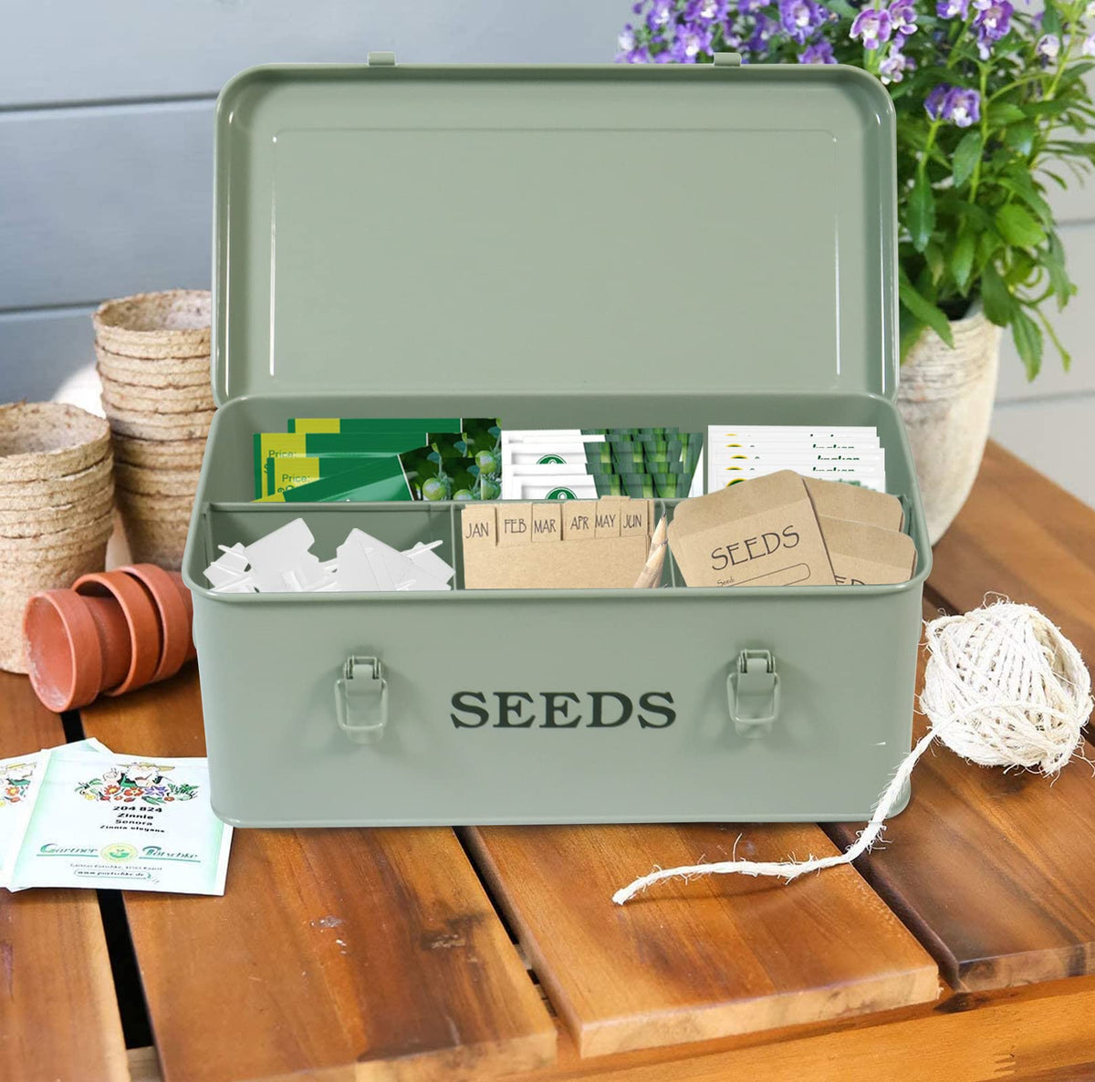 Xbopetda four-compartment seed tin fits varied seed sizes.