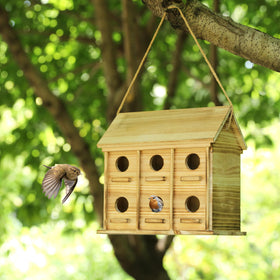 XDYGHH Outdoor bird hotel blends rustic charm with wildlife habitat.