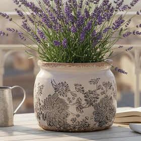Xiaan Jiaju planter with drainage hole keeps herbs and succulents healthy.