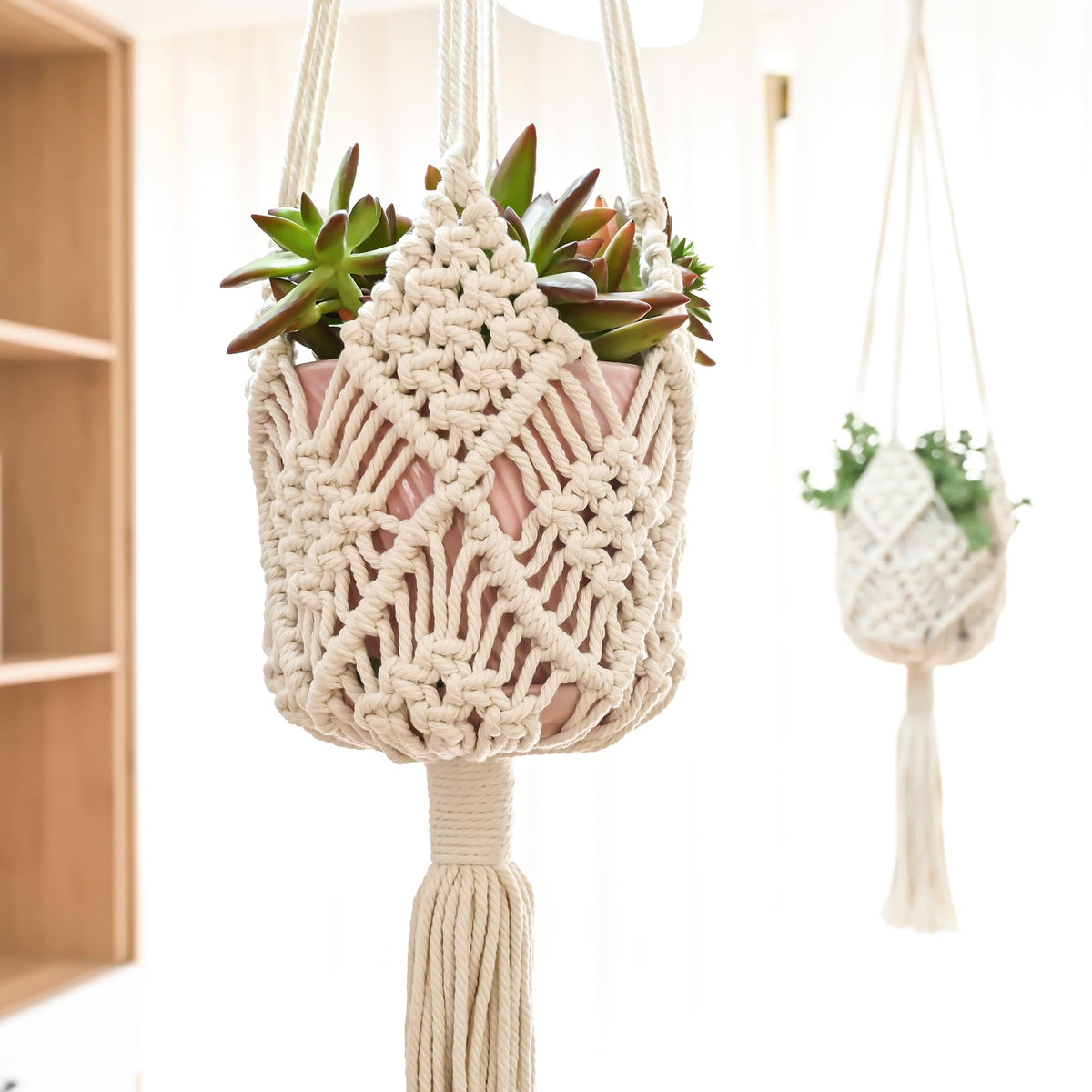 XINBOR hanging planter patterns ensemble shown in a bright living room for elegant vertical gardening.