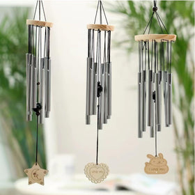 Five-length wind chime tubes arranged to showcase variety and balance.