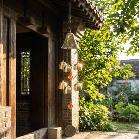 XUJIQI dragon motif wind bell at entry adds welcoming ambience.