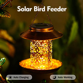 YADOOLIFE solar-powered bird feeder illuminated at night for gentle ambiance.