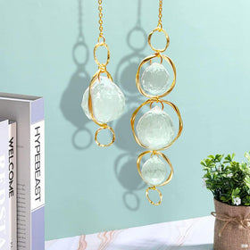 Yajuo crystal suncatcher ball decoration with a metal ring adds shimmer.