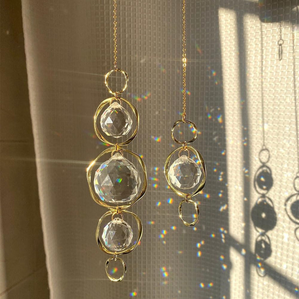 Yajuo crystal suncatcher prisms outdoors, creating colorful rainbow reflections.