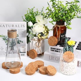 Yalikop multi use feet fit vases and small furniture alike.