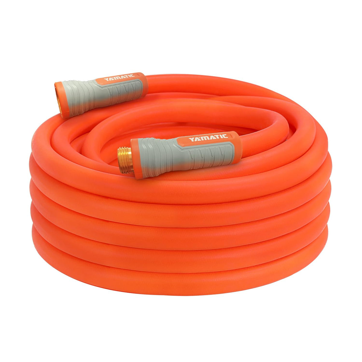 YAMATIC heavy duty garden hose with swivel fittings in use for yard irrigation.
