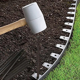 YANEYRIE edging spikes for pavers enable neat, defined borders.